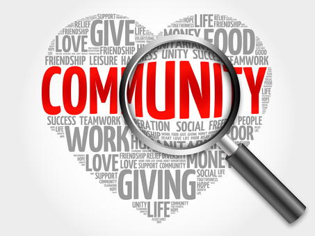 Heart with words about community and giving in it