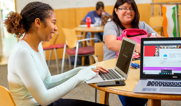 NCCU Students at computers using the new nccu.edu website.