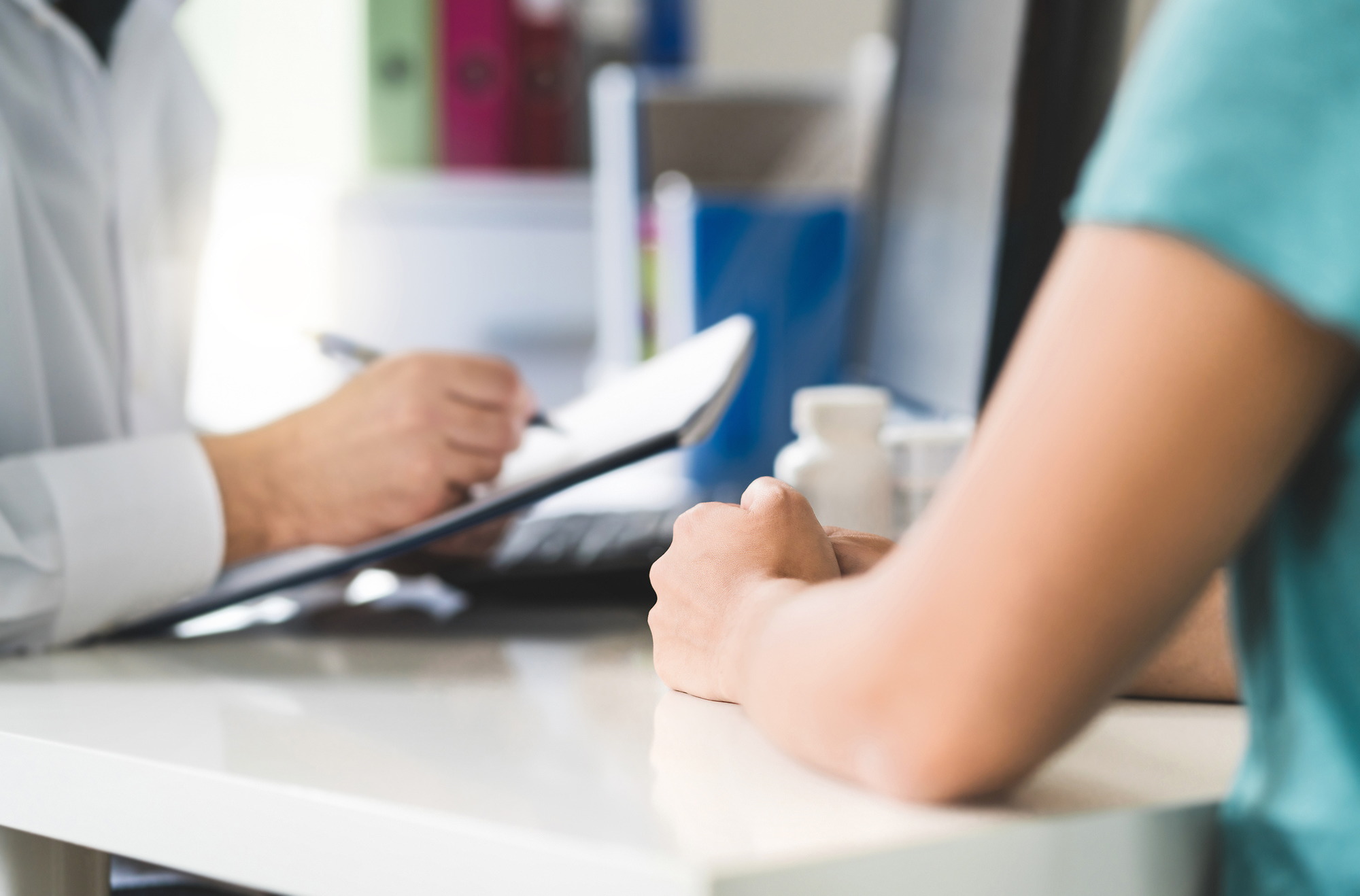 doctor looks at chart