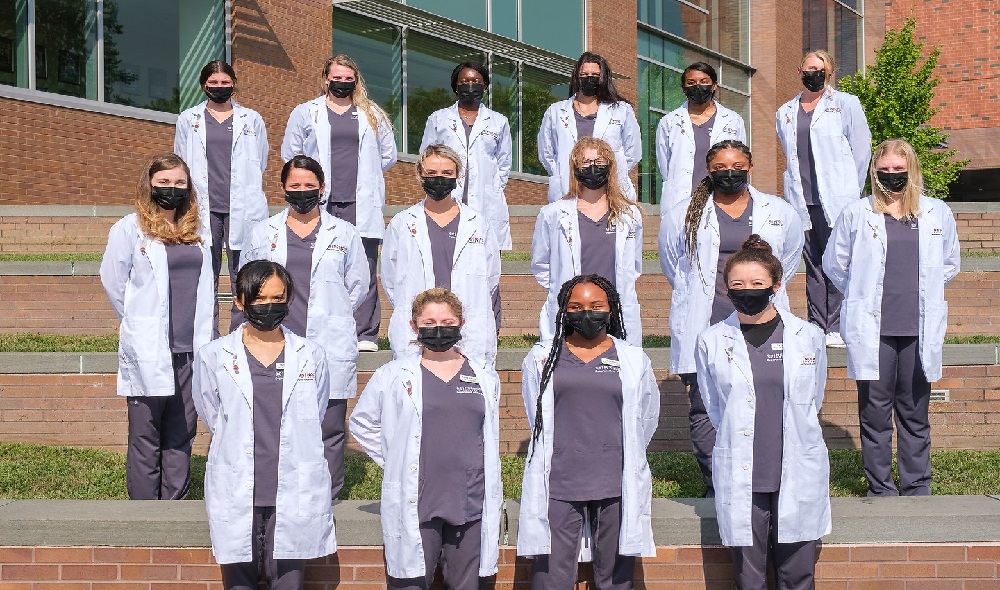 Nursing students in a group photo.