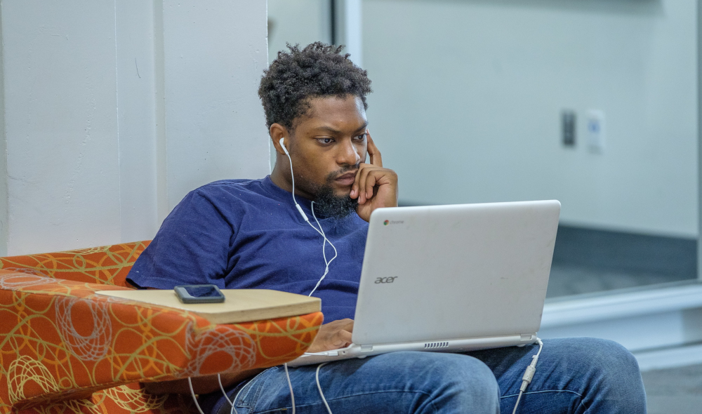 Man focused on a laptop