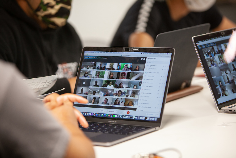 Virtual meeting opened in laptop screen
