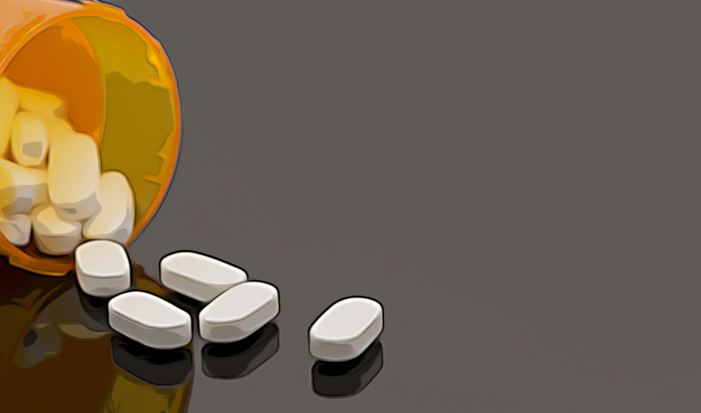 opioid white pills spilled out on table