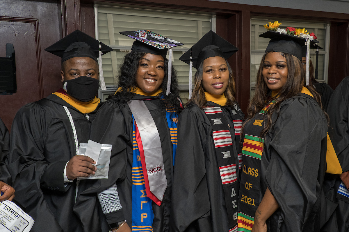 graduates in cap and gown