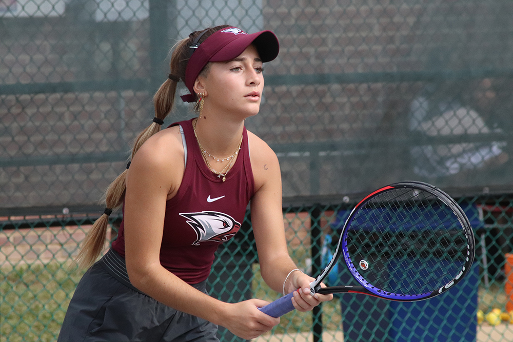NCCU Student playing Tennis