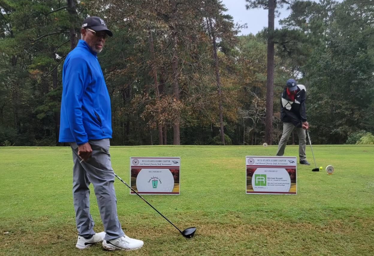 Alumni playing Golf