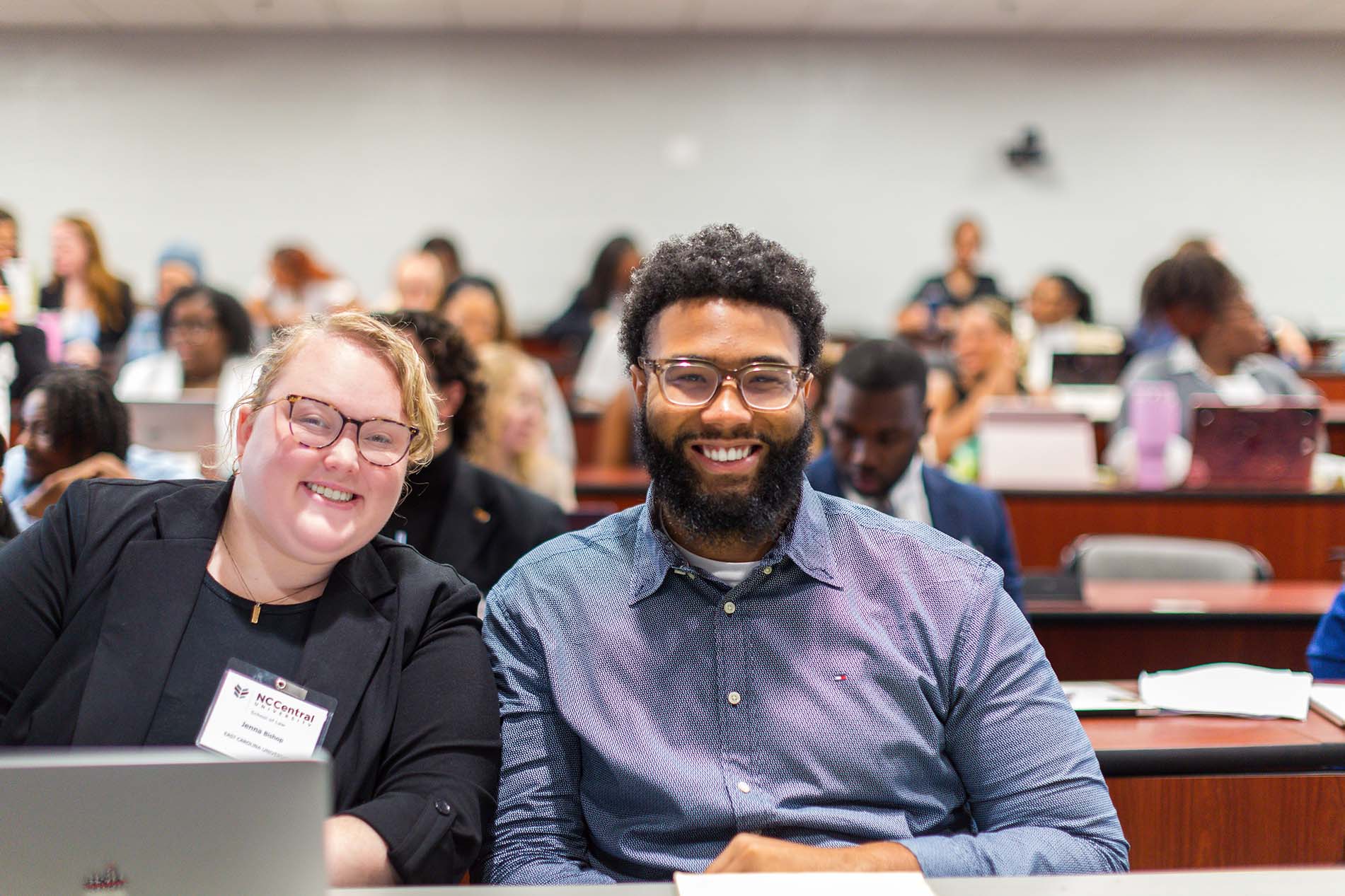 Two people smiling