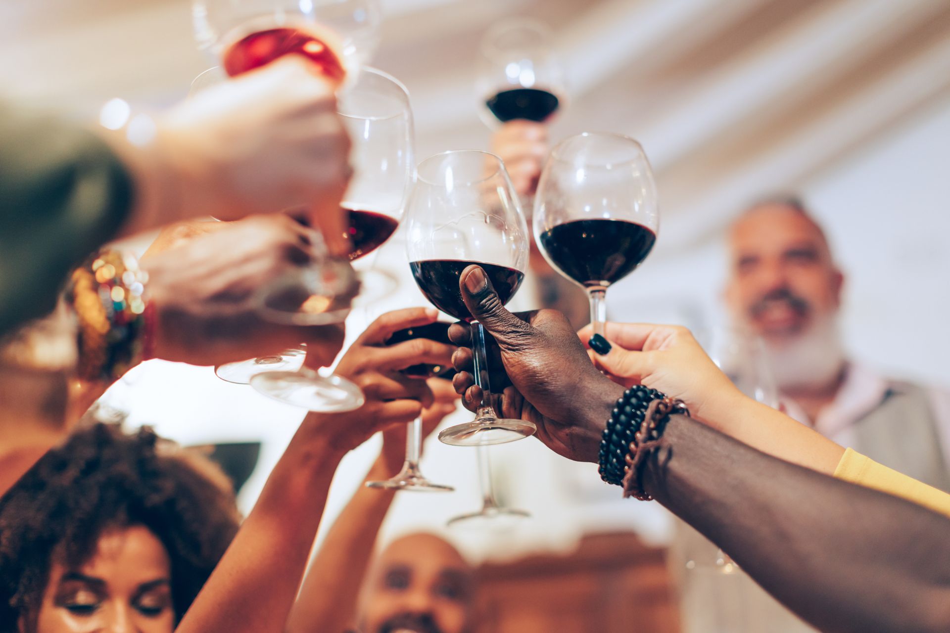 toasting with wine glasses