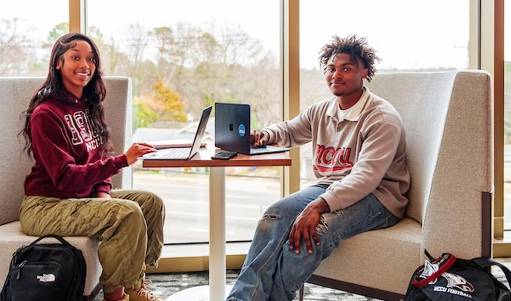 students with laptops
