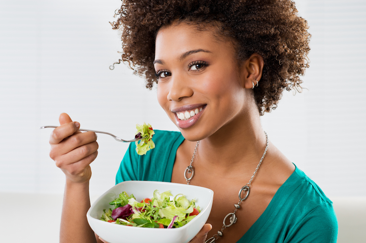 Woman eating a salad