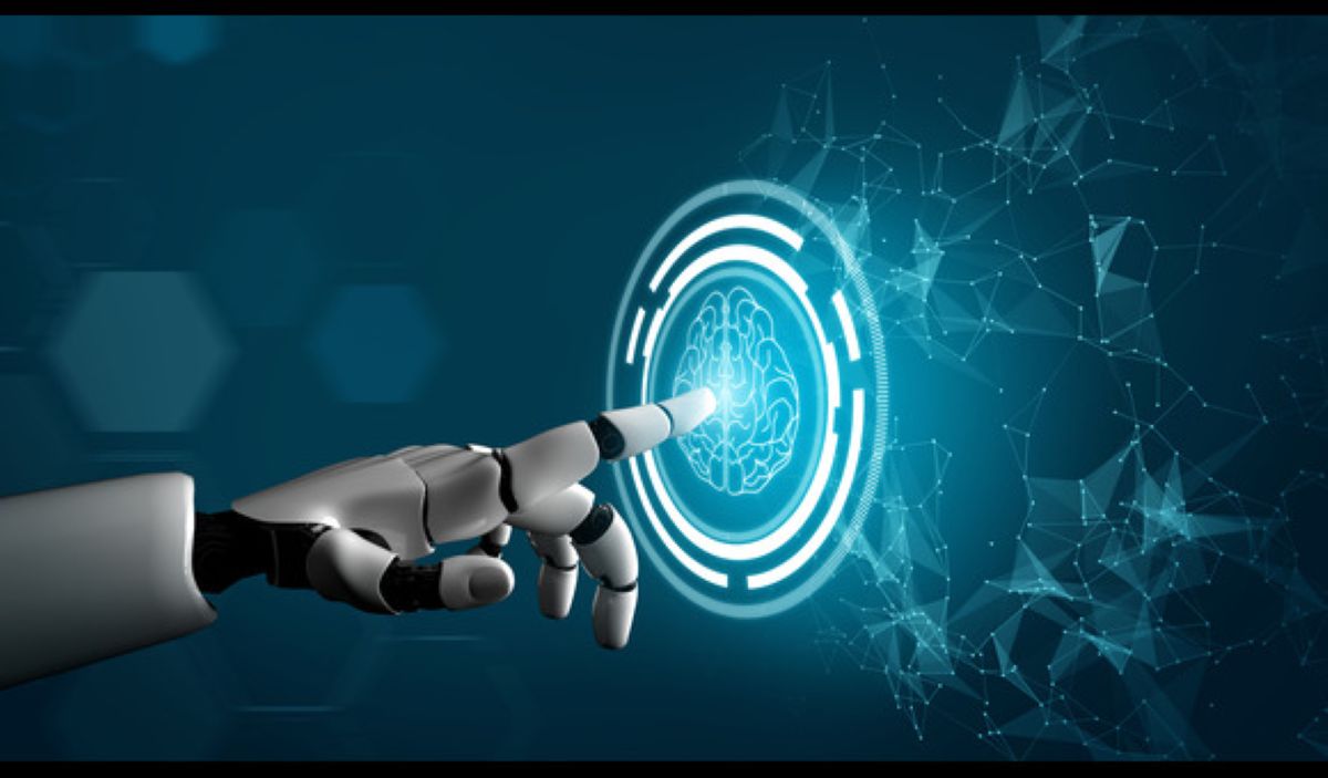 robot hand touching a blue button