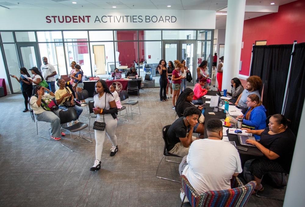 Student inside the Activity Board Center