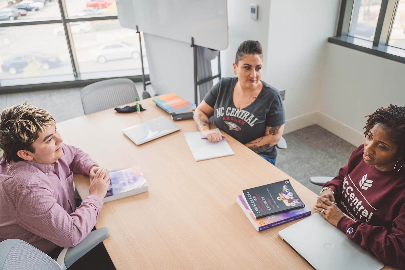 3 Students talking
