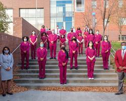 Nursing students standing wearing mask