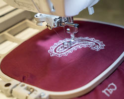 Embroidery print via sewing machine