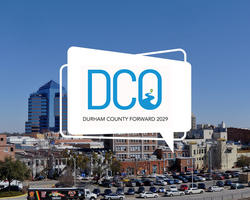 Durham County Forward logo with downtown durham as the background
