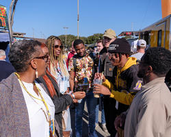Several African American adults at a Jazz Festival
