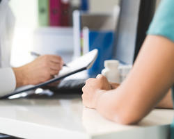 Doctor is giving instruction to the patient