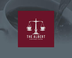 The Albert Coffee Café logo with an image of coffee being poured behind