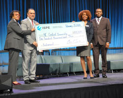 NCCU receiving a check