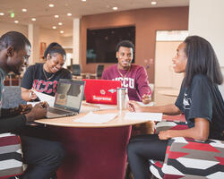 students at a table