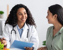 two women talking at clinic