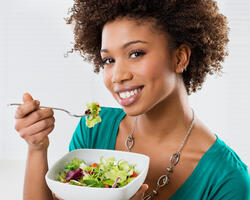Woman eating a salad