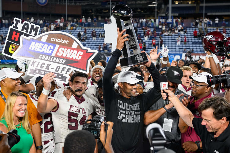 NCCU Football players and fans on field