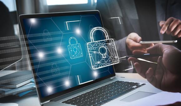 laptop screen with cybersecurity design