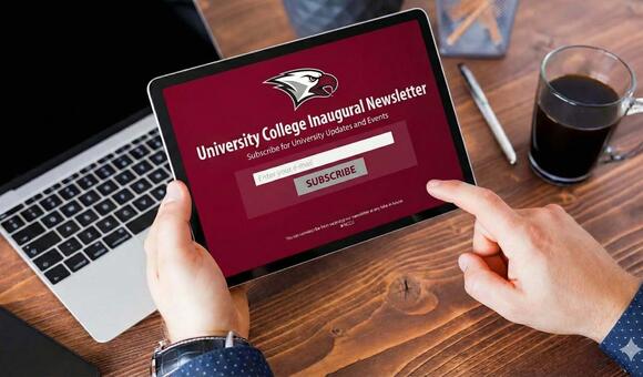 tablet with newsletter