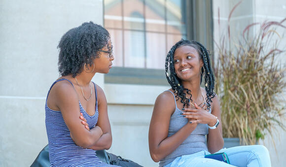 Two women talking
