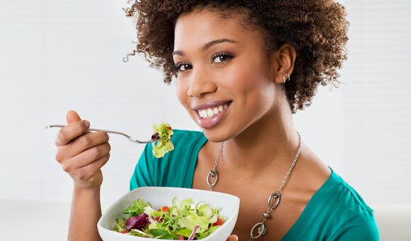 Woman eating a salad