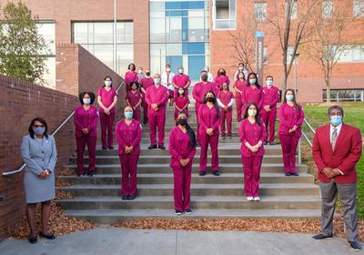 Nursing students standing wearing mask