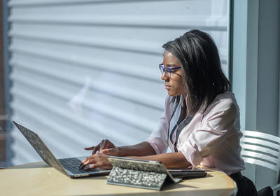 woman working on laptop