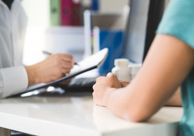 Doctor is giving instruction to the patient