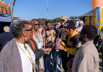 Several African American adults at a Jazz Festival