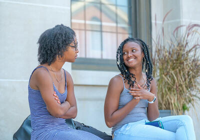 Two women talking