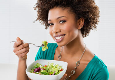Woman eating a salad